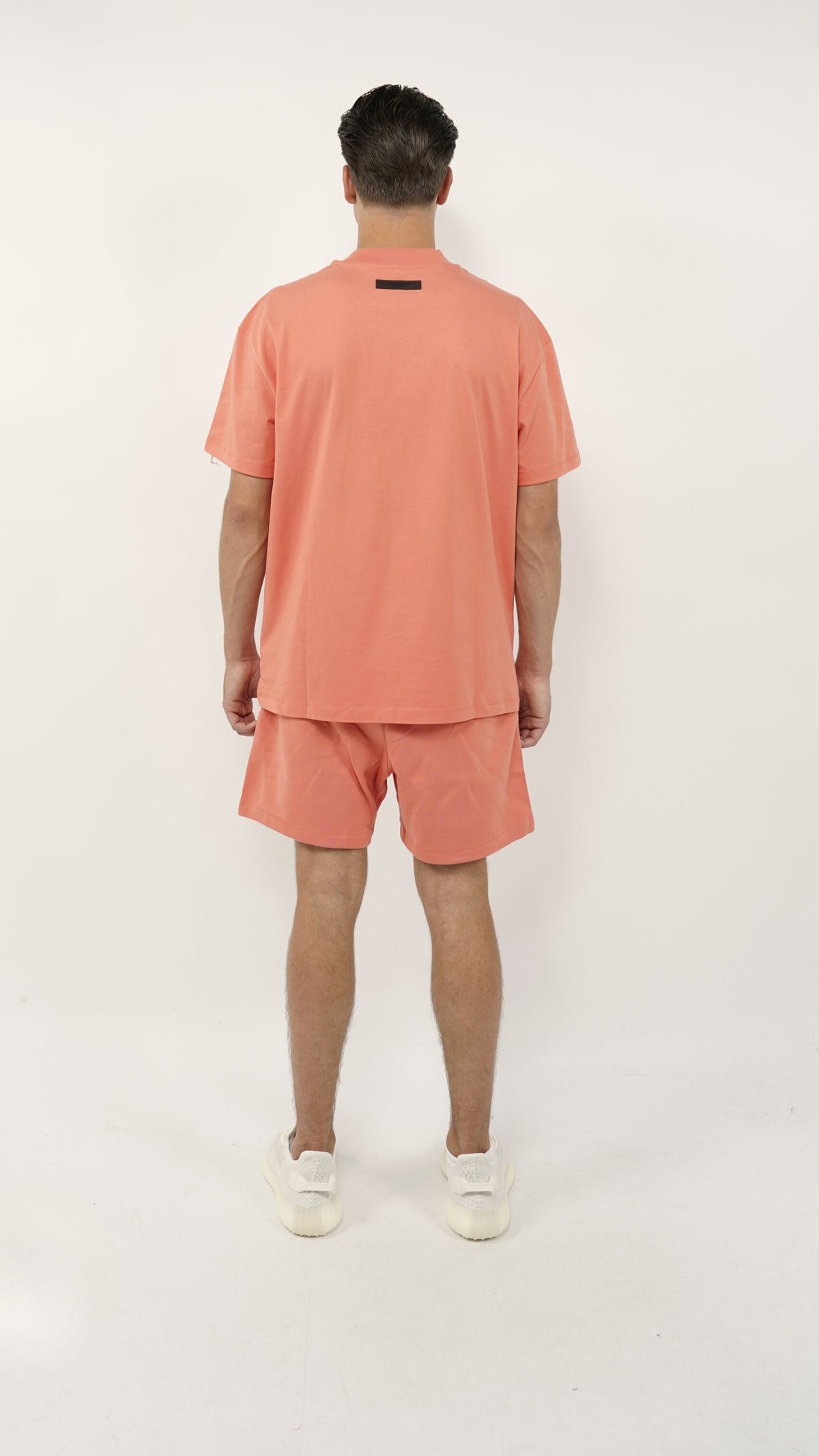 Fear of God Essentials Korallenfarbenes Sommerset